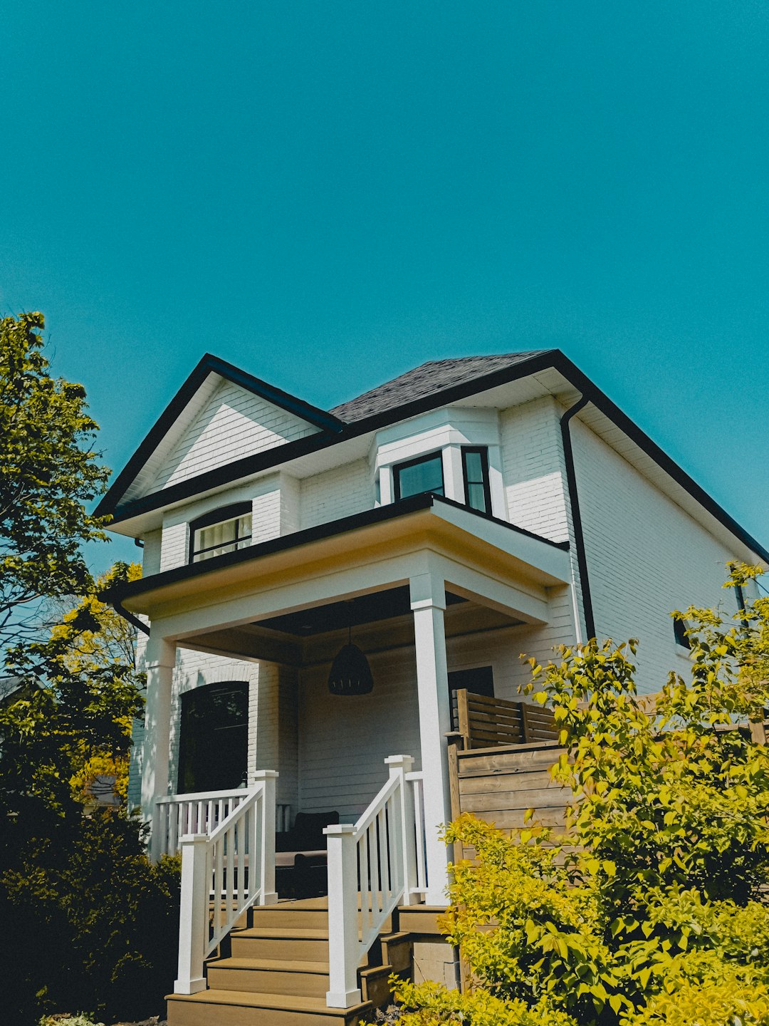 cute downtown house with trees
